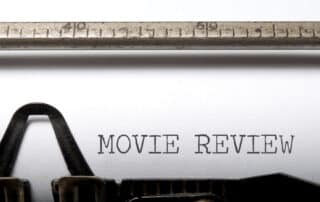 Movie review typed on typewriter