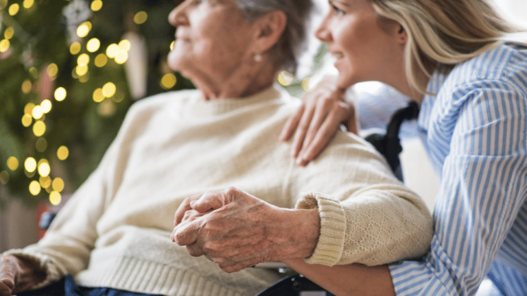 Elder women and young woman holding hands during the holidays