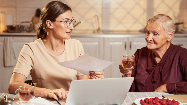 Elderly with child on computer.